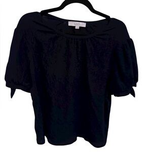 Loft Navy Blue Top with Textured Fabric and Bow Accents on the sleeves. EUC